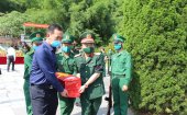 Lễ truy điệu và an táng 15 hài cốt liệt sĩ quân tình nguyện và chuyên gia Việt Nam hy sinh tại nước CHDCND Lào